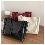 sac à bandoulière noir brillant