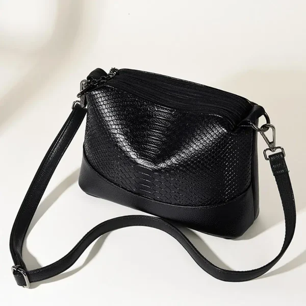 sac à main crocodile noir à bandoulière