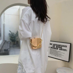 sac compact doré
